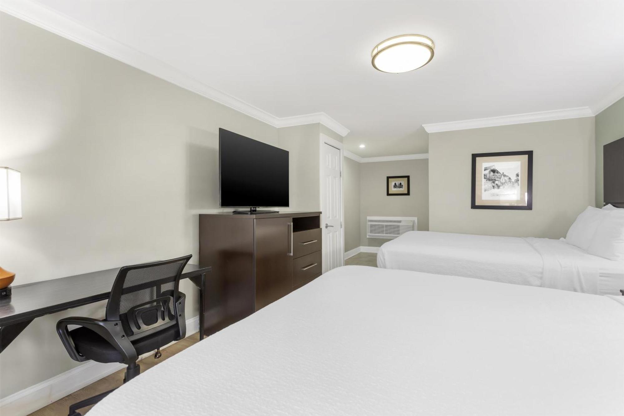 Queen Room Two Queen Beds Roll Shower Disability Access or Non-Smoking